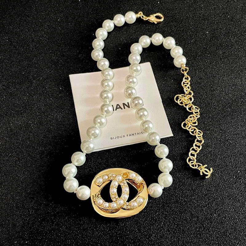 Chanel Pearl-Style Beaded Necklace with Gold-Tone Chain and Emblem Pendant